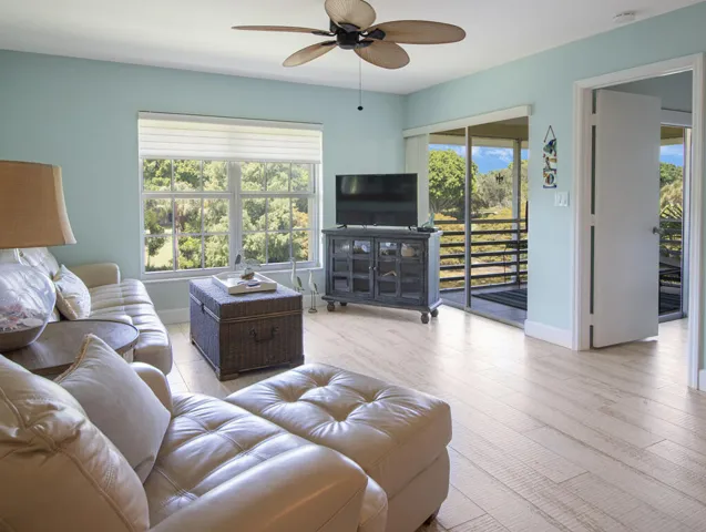 Open living space with water and golf views.