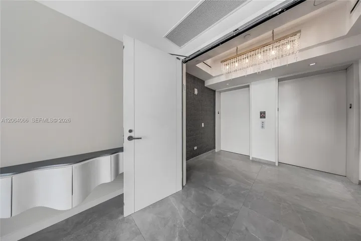 2 Elevators to a private foyer, double doors entrance