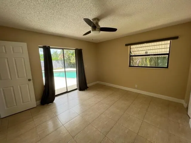 2nd Bedroom with pool view and access