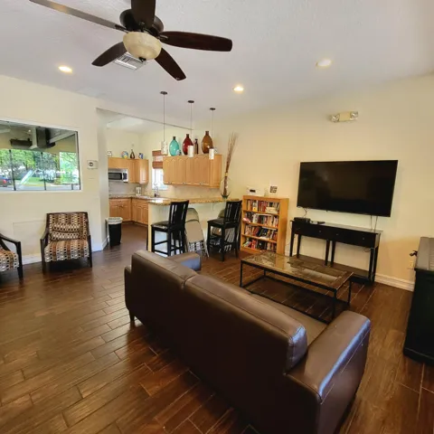 COMMUNITY ROOM WITH TV & A FULL KITCHEN
