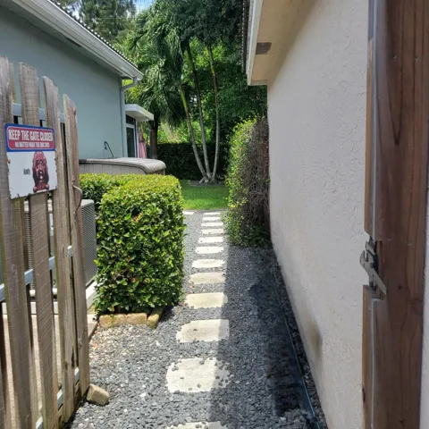 FULLY FENCED PRIVATE BACKYARD WITH SIDE GATES