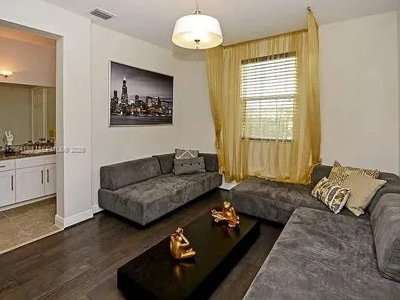 3rd bedroom with private full bath, on main level.