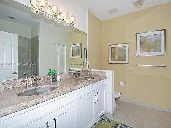 Dual sinks on this spacious Primary Bathroom