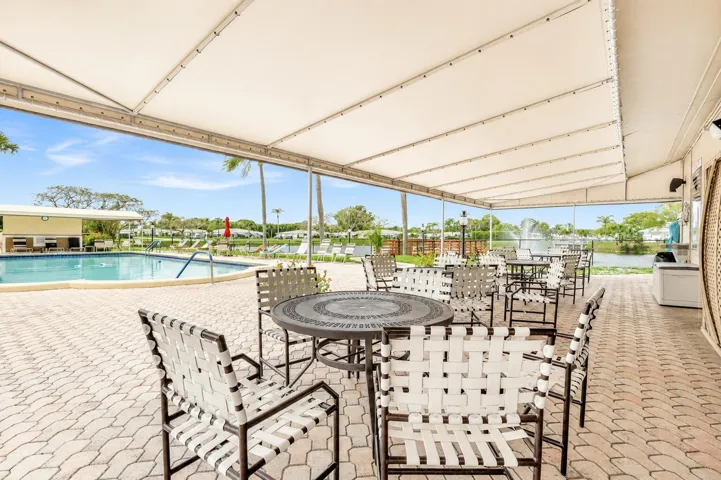 pool area with chairs