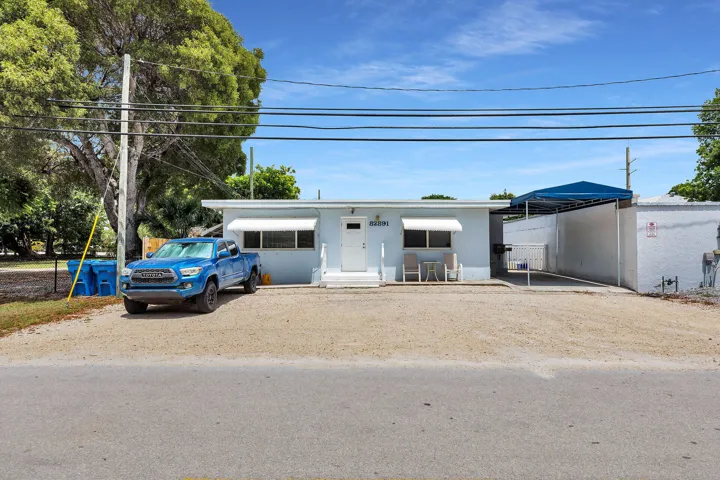 Rear Covered Entrance, gate & Awning Structure off Old Highway