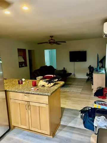 Kitchen Island & Breakfast Bar Area in Main Residence (Unit A)