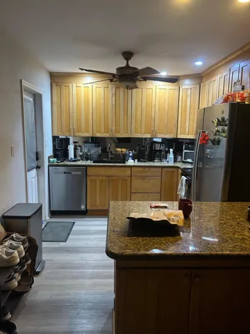 Unit A Fully Equipped Kitchen featuring Refrigerator, Range & Microwave