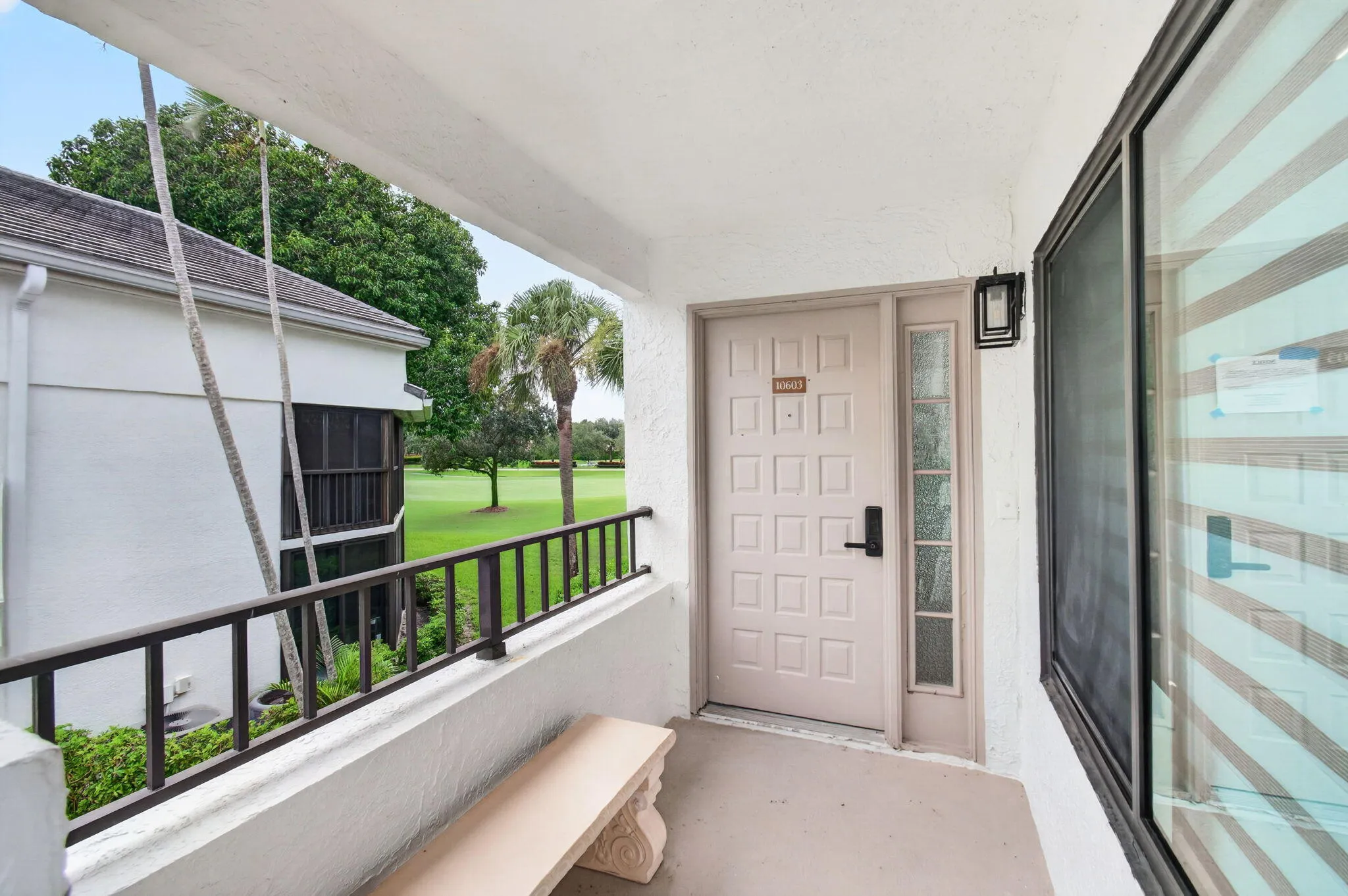 View from stair to front door