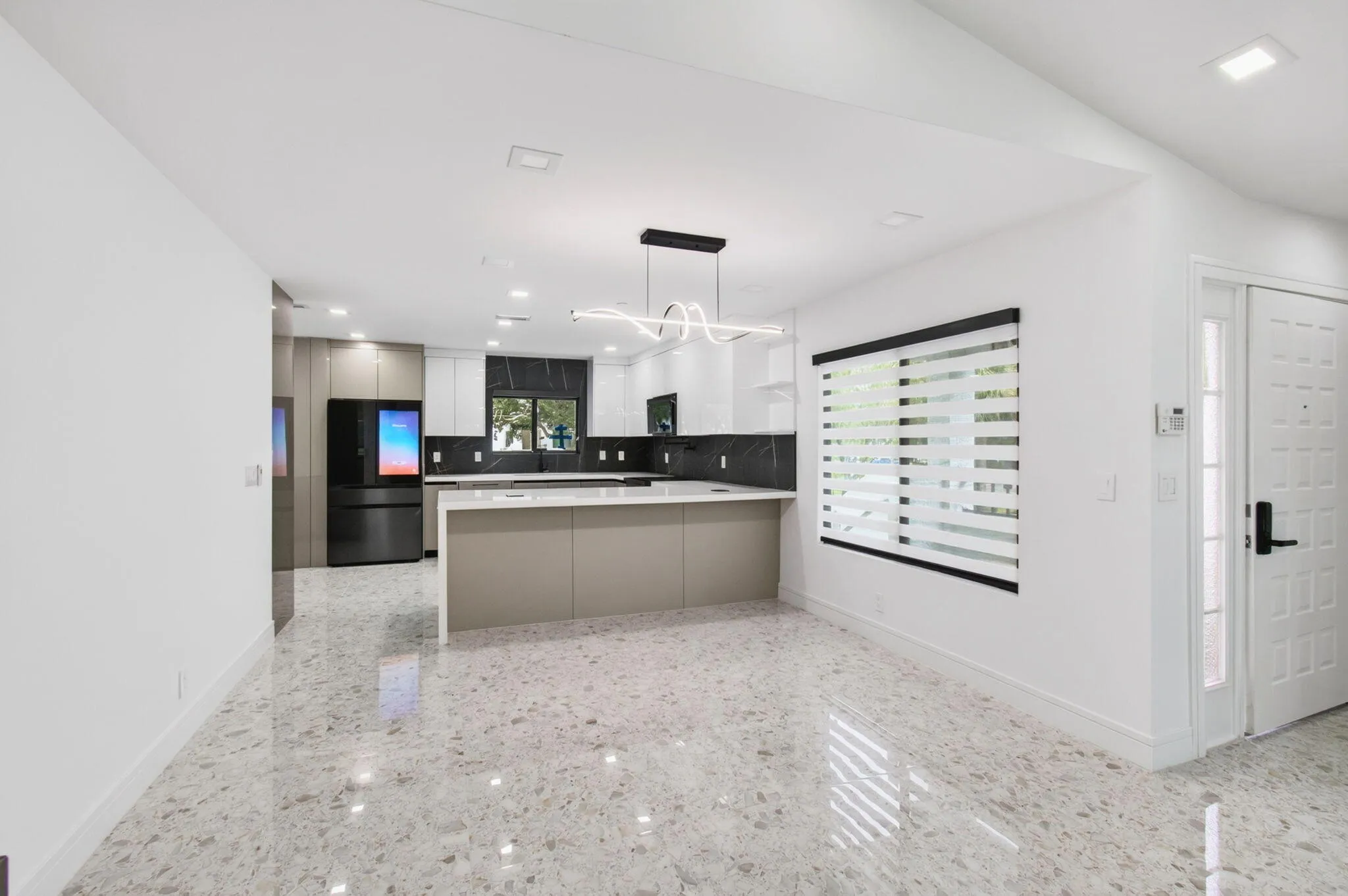 View to dining and kitchen area
