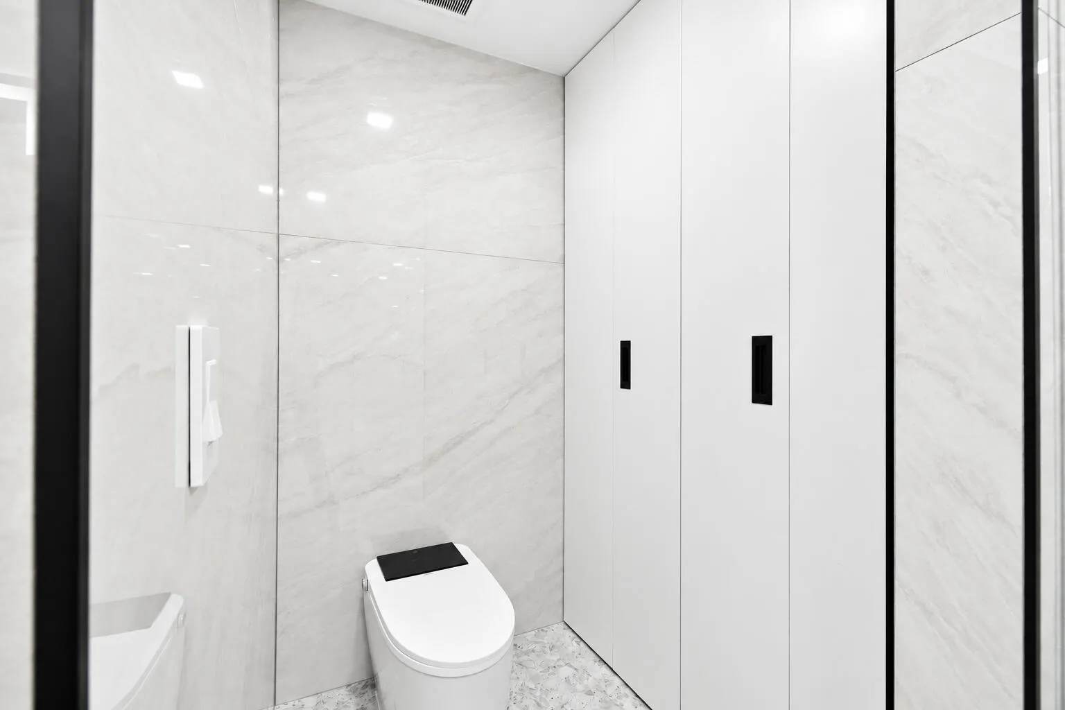 Master smart toilet, closet to right closed