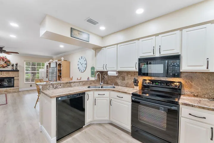 Kitchen connects to Eat in Kitchen area and Living Room