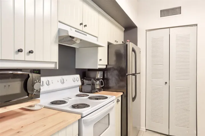 Kitchen with Laundry Room Located off it