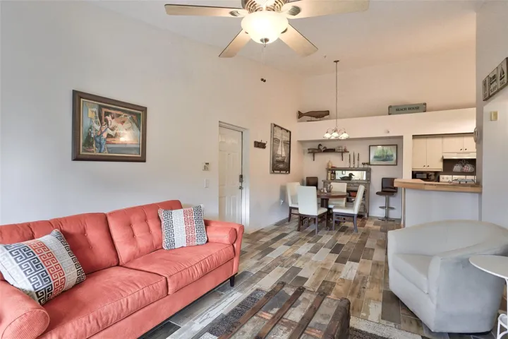 It has an open living/kitchen concept that offers a breakfast bar and a large private balcony.