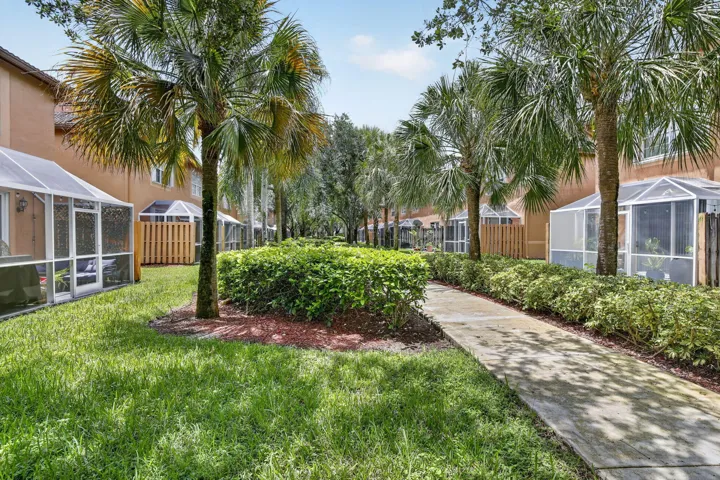 Sidewalk behind townhome