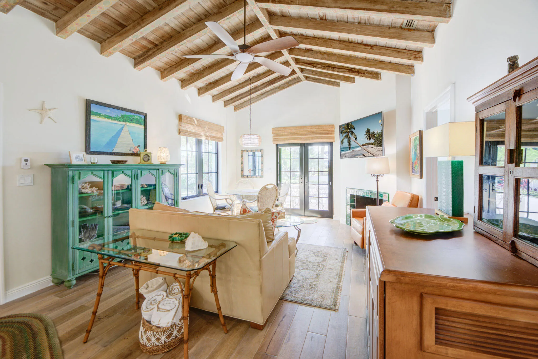 Vaulted wood-beam ceiling with an overhead fan