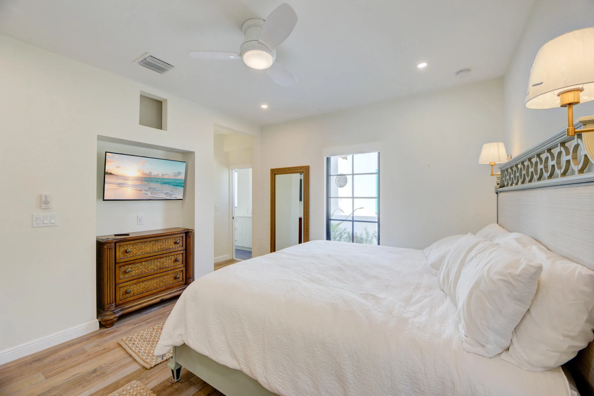 Bedroom featuring wood-finish flooring, recessed lighting, and a ceiling fan