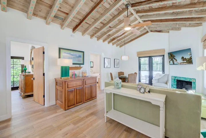 Vaulted wood-beam ceiling with decorative accents