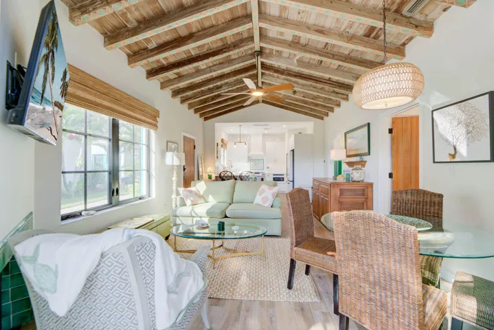 Vaulted wood-beam ceiling with original 1938 painted stencils.