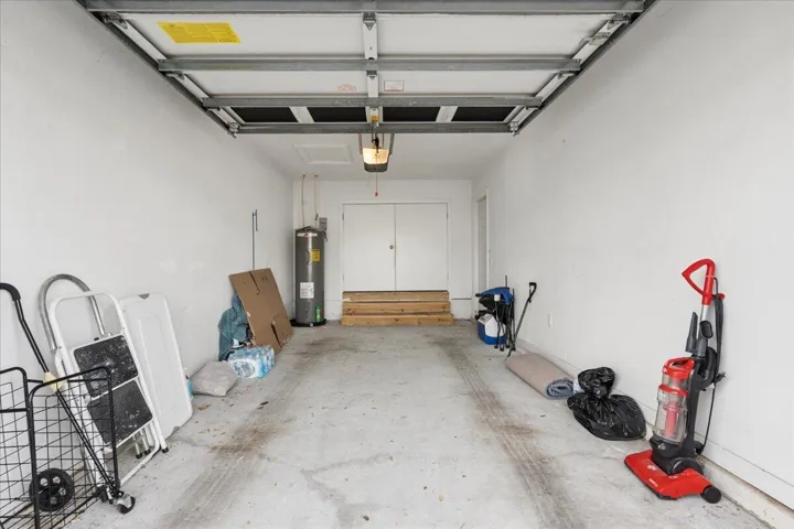 Garage with Doors Into Condo