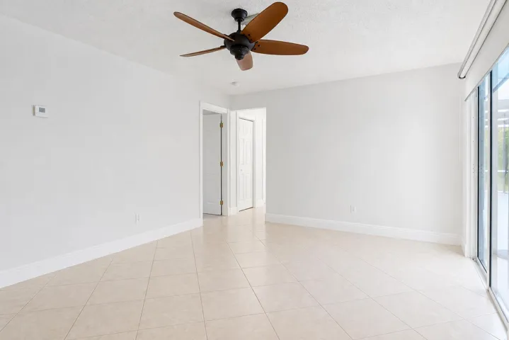 family room with sliders to porch and po