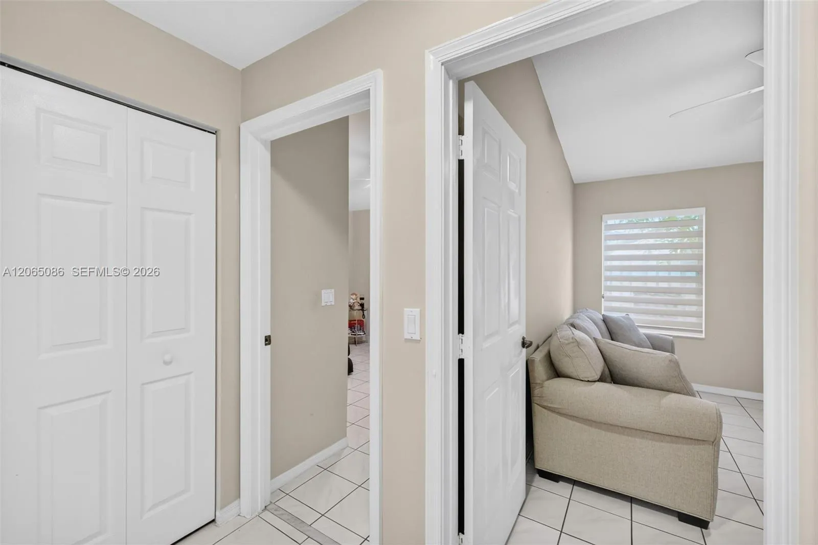 View from hallway to two guest bedrooms, and linen closet