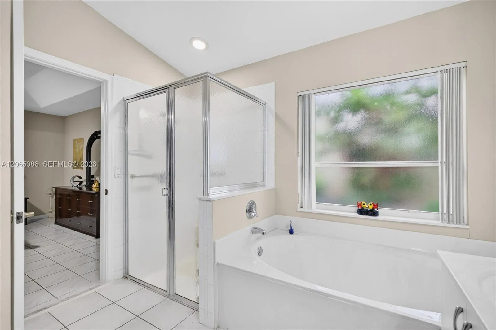 Windowed Primary Bathroom w/ Separate Shower and Tub