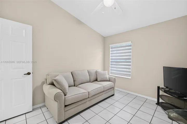 Guest Bedroom - Tile w/ roller shade