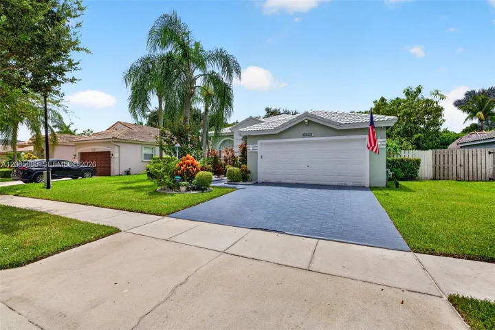 Beautiful entry w/ lovely landscaping