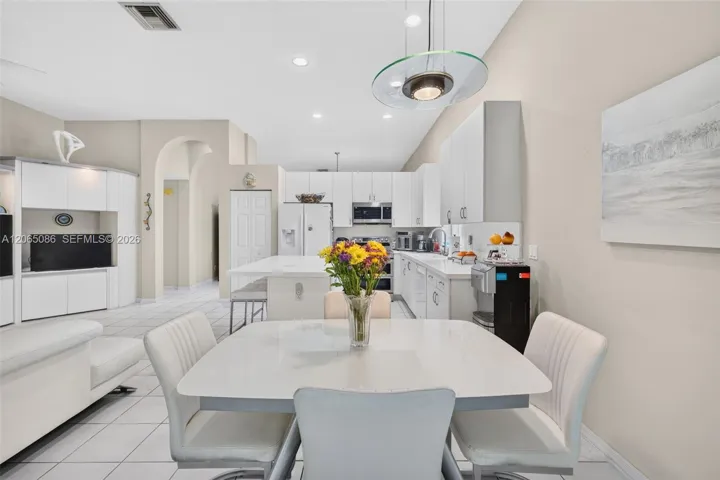 Eat in Kitchen overlooks backyard / Great room