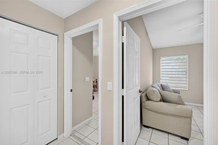 View from hallway to two guest bedrooms, and linen closet
