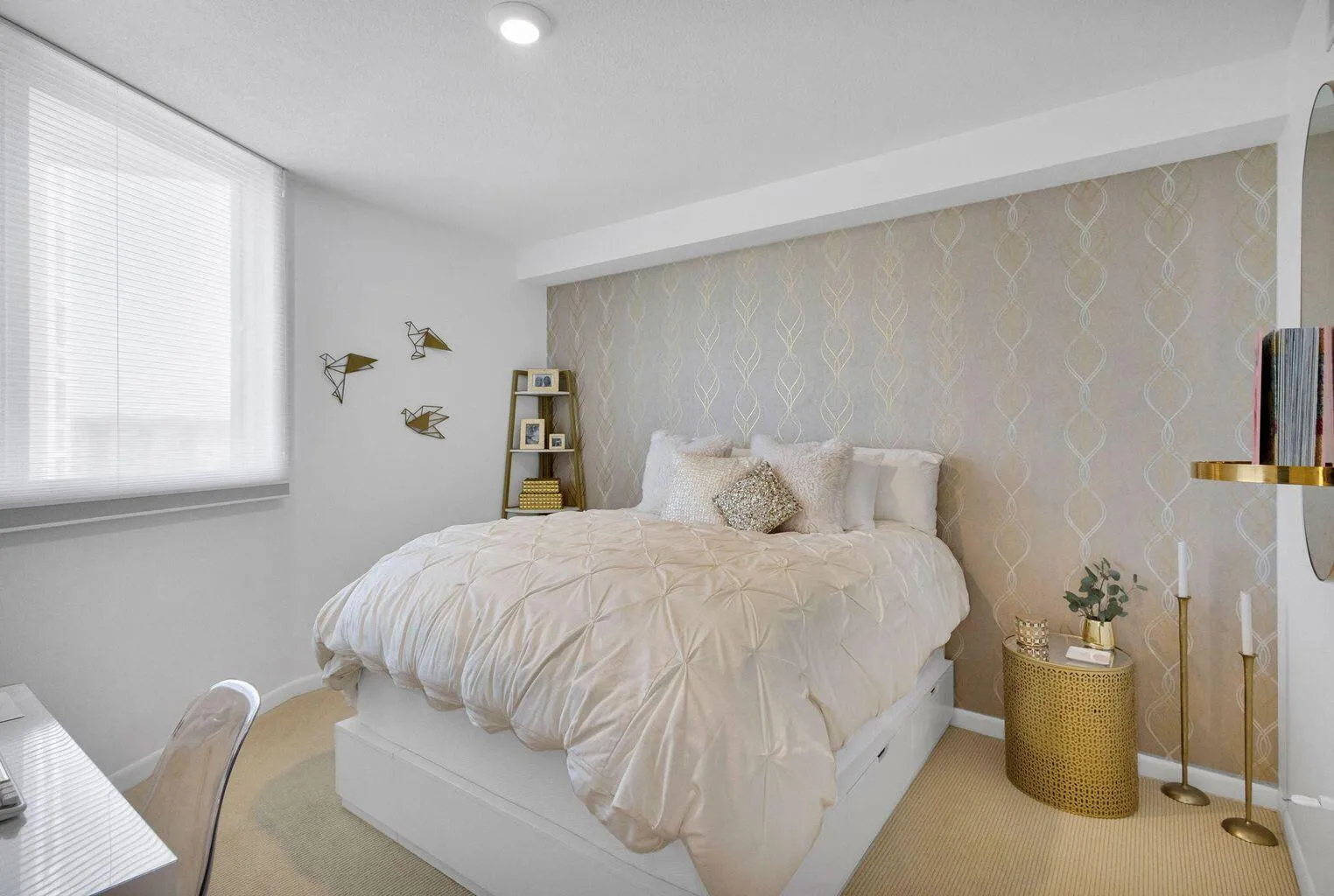 Bedroom featuring patterned accent wall, recessed lighting, window with horizontal blinds, and carpeted flooring
