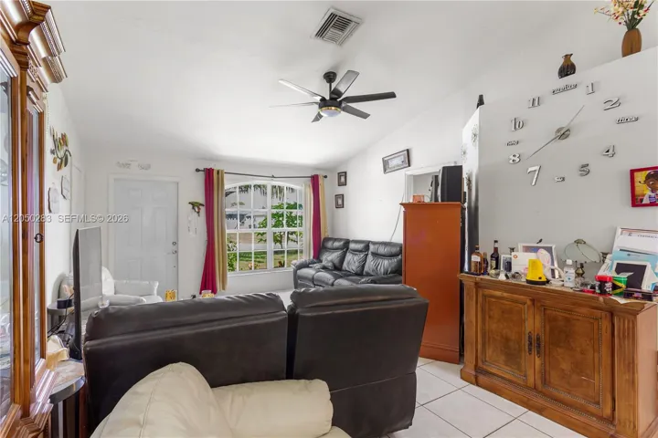 The PRIMARY SUITE is privately located on one side of the home and features a HALLWAY ENTRY with the IN-RESIDENCE LAUNDRY AREA conveniently tucked away.