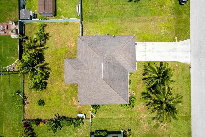 KEY FEATURES INCLUDE Newer Roof (2019), Newer A/C System (2021), Tile Floors Throughout, 2-Car Garage plus Concrete Driveway, Screen-Enclosed Lanai, Spacious Backyard – Room for a Pool, 0.23-Acre Lot (10,019 sq ft), 1,422 sq ft under air