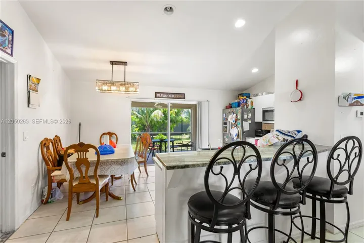 The SPACIOUS KITCHEN is designed with function and style in mind, offering plenty of GRANITE COUNTER SPACE, cabinets, a pantry