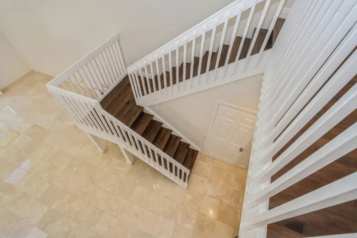 17_5504FoxHollowDr_68_Staircase_Large