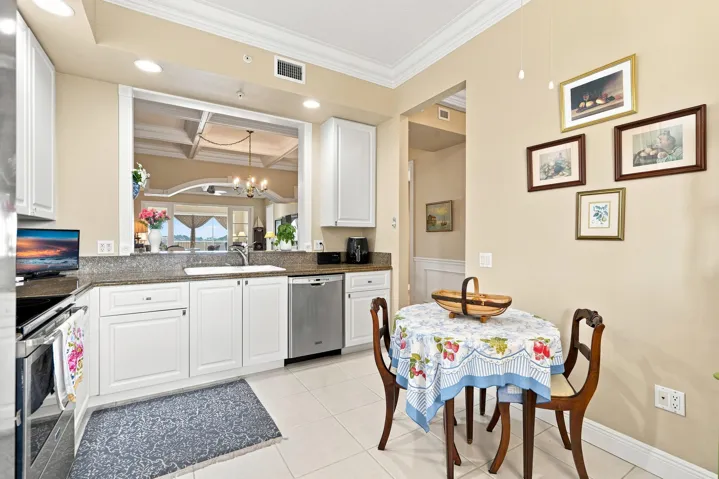 Kitchen features stainless Maytag appliances and refaced and reinforced cabinetry with new pulls. Microwave installed 2024.