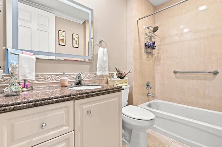 Second Bathroom features New Fan, LED Mirror with Backlit + Frontlit, Anti-Fog Tempered Glass, and New LED Ceiling Lights.