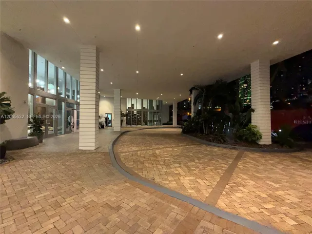 Covered driveway leading to the main lobby entrance