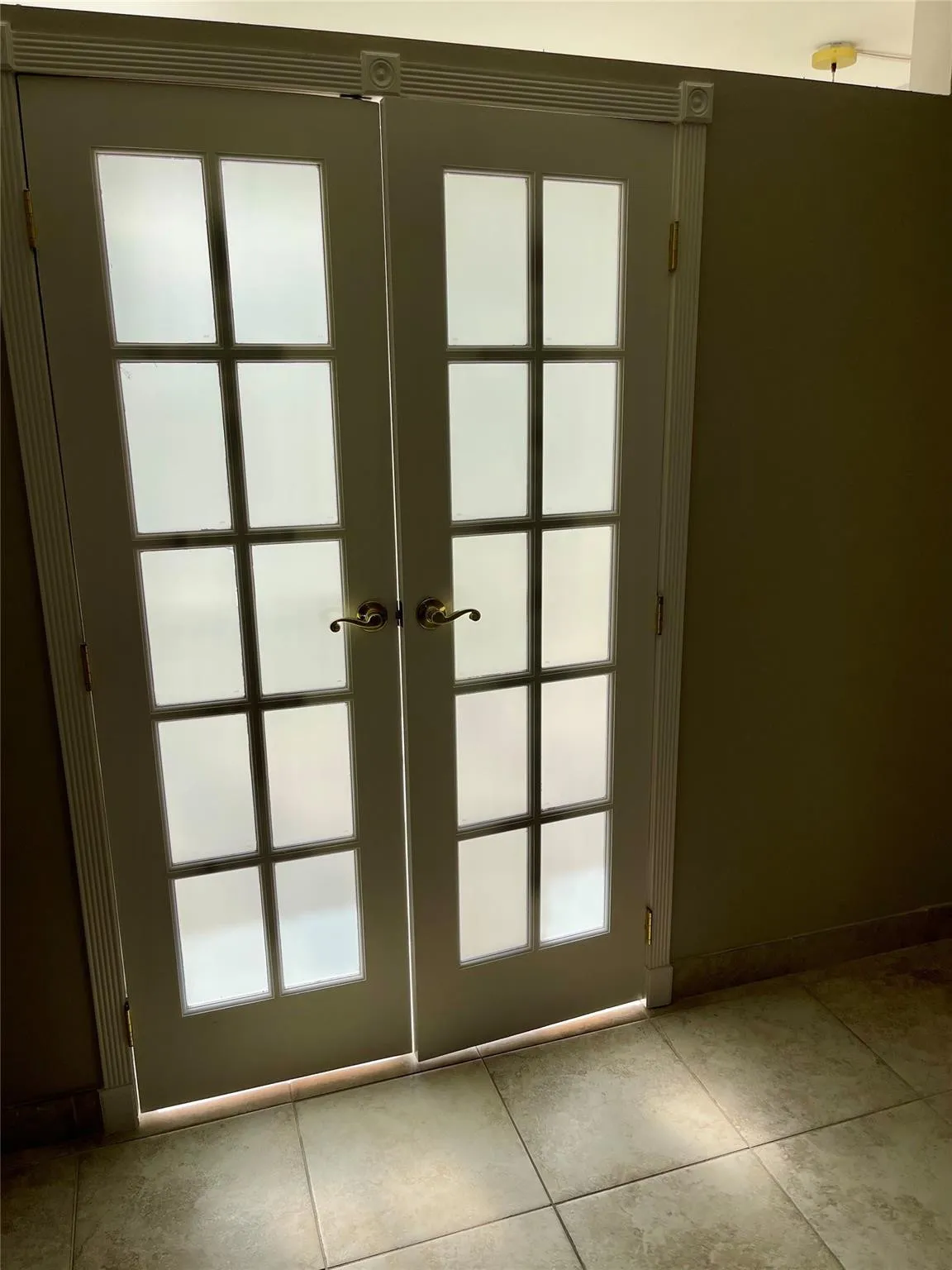 French doors to den.