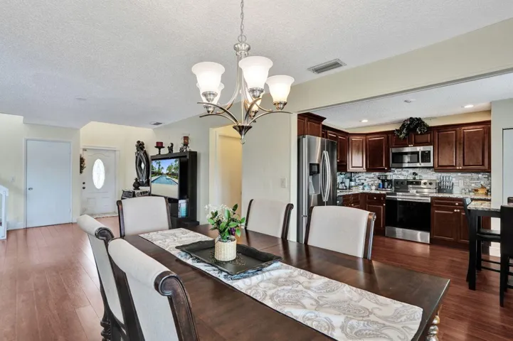 DINNING ROOM LOOKING INTO KITCHEN