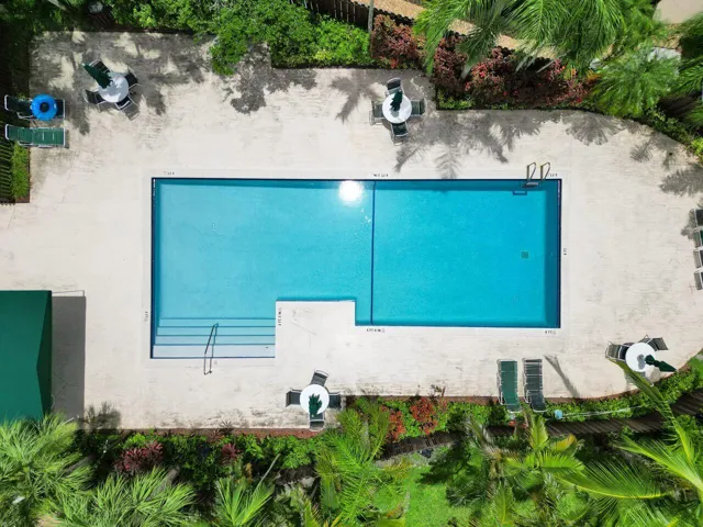 COMMUNITY POOL JUST STEPS FROM THIS HOME