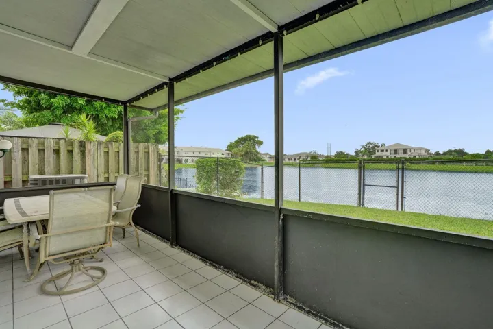 NICE SIZE SCREENED IN PATIO WITH ROOF