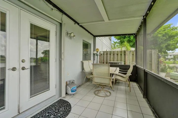 FRENCH DOOR THAT LEADS OUT TO PATIO