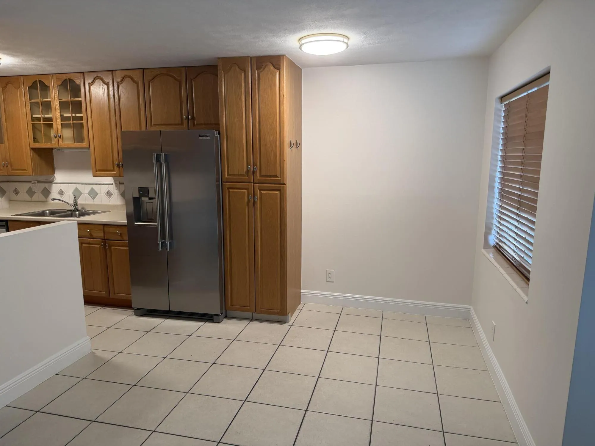 Kitchen and Room for Table