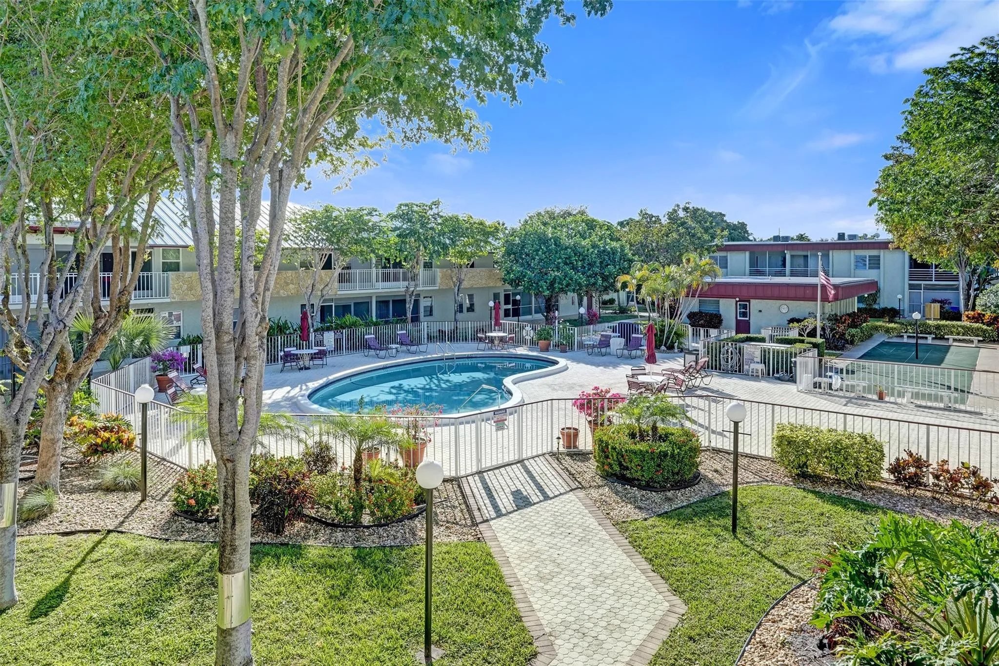 Renovated pool and sundeck with beautiful pavers.