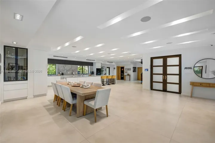 Purposefully reimagined to maximize light, flow, and connection, the expansive open-concept design is ideal for modern family living and entertaining.