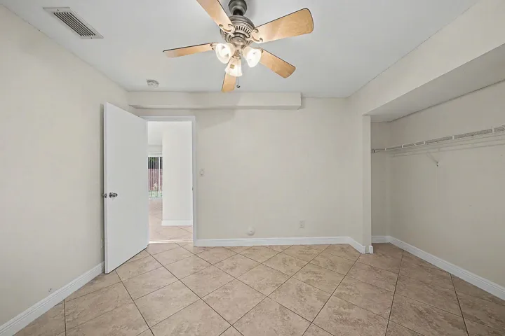Light-toned tile flooring throughout