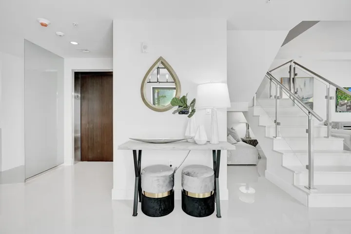 Bright hallway with polished white flooring