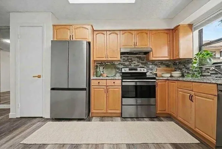 Stainless Appliances and Granite Counters, BackSplash