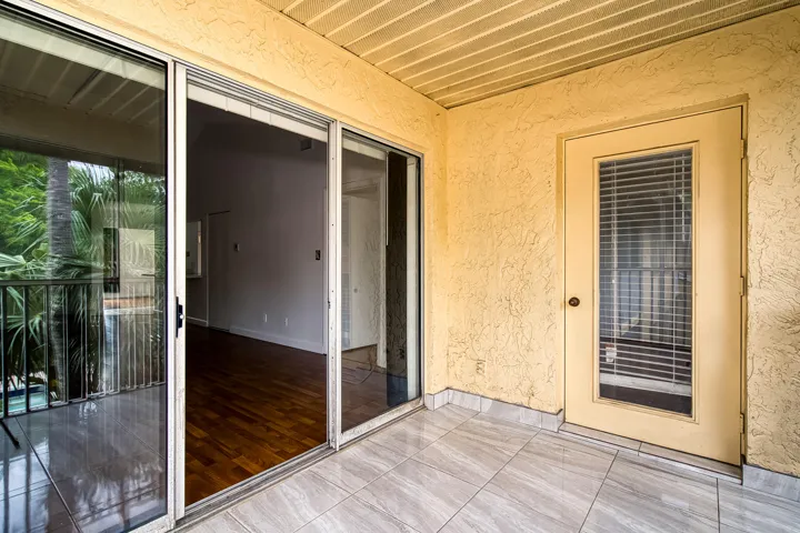 another view of the patio with 2 exits from living room and master bedroom